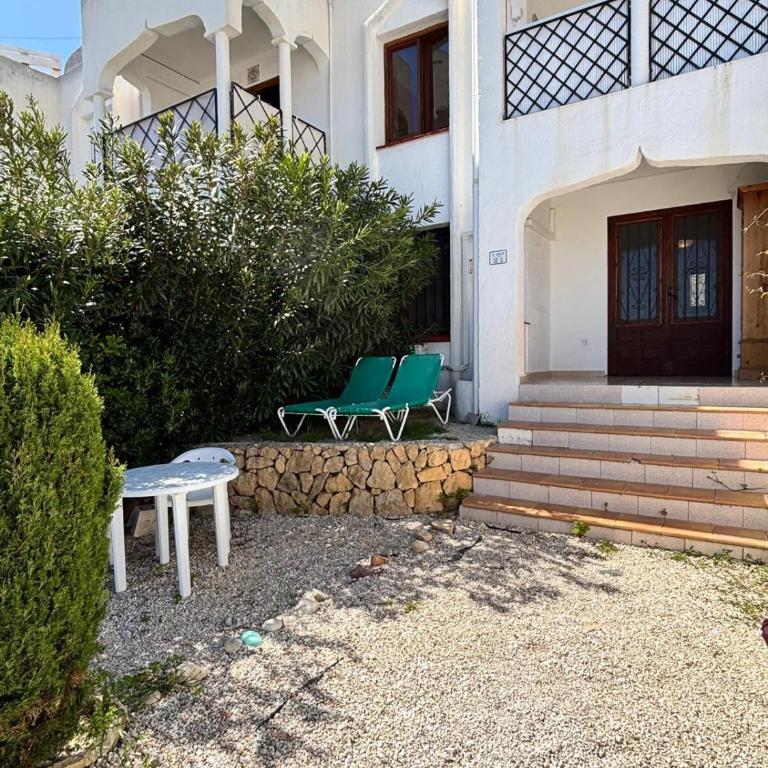 Apartamento con jardín, piscina y parking - Apartamento de 2 dormitorios - 34