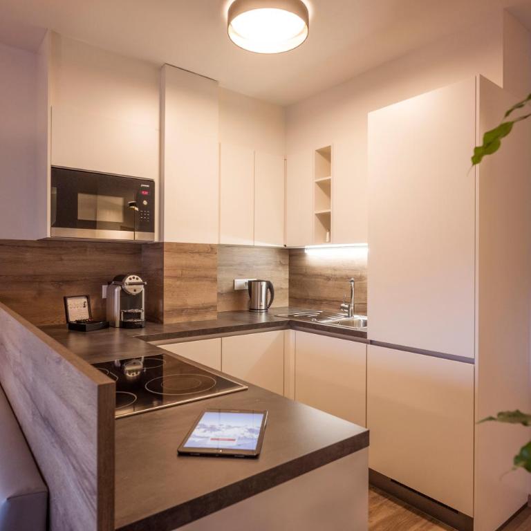 Aparthotel AlpTirol - Apartment mit 2 Schlafzimmern und Balkon (Zillertal Deluxe) - 5