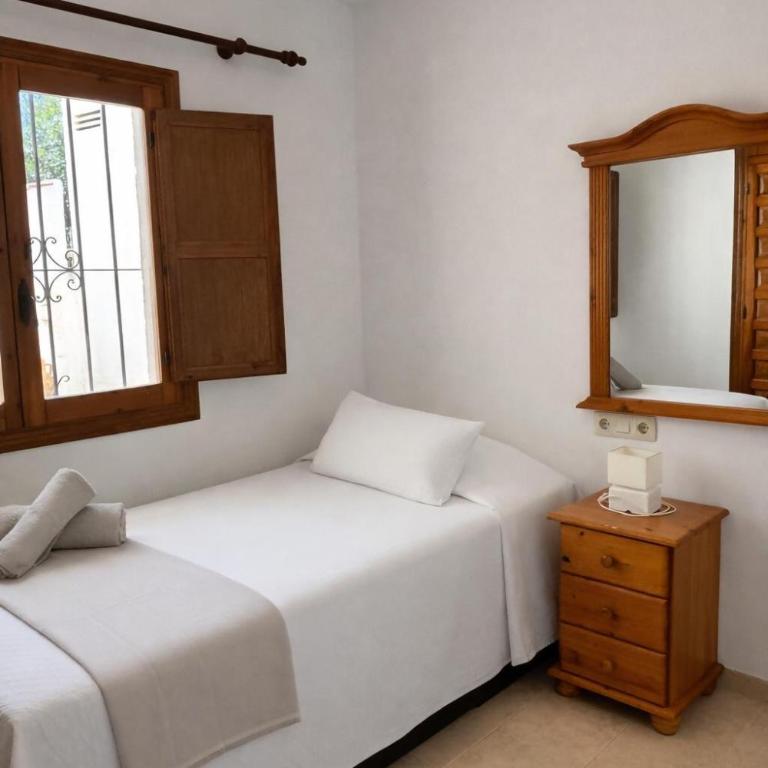 Apartamento con jardín, piscina y parking - Apartamento de 2 dormitorios - 43