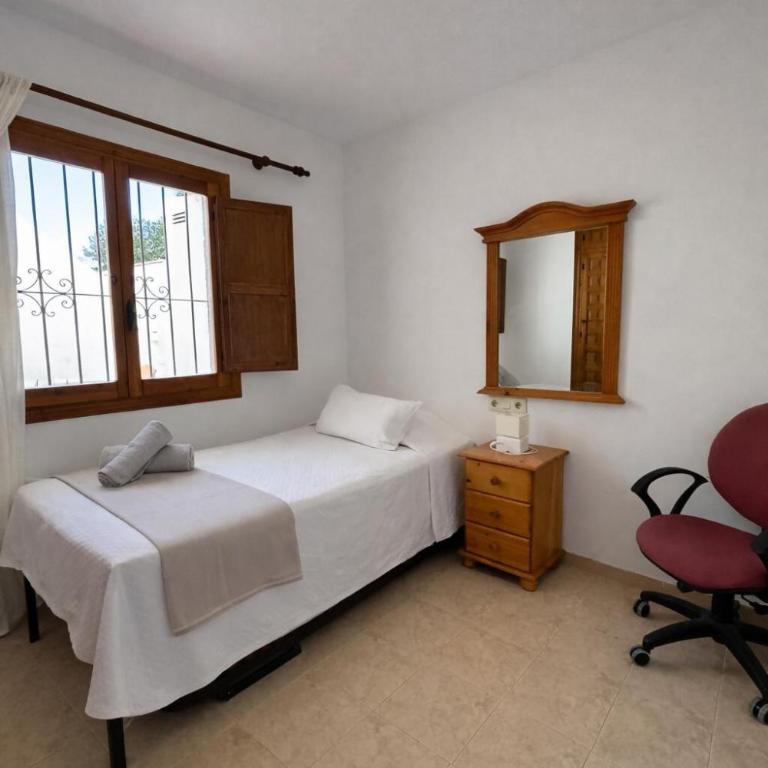 Apartamento con jardín, piscina y parking - Apartamento de 2 dormitorios - 45