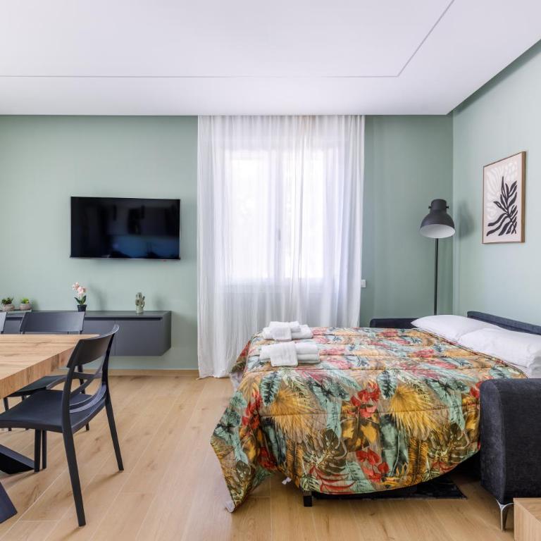 Residence Campo Dei Fiori Free Parking and WiFi - Appartamento Premium con 3 Camere da Letto e Balcone - 11