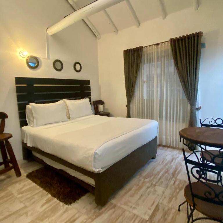 HOTEL BOUTIQUE Santa Helena - Habitación Doble Deluxe con cama supletoria - 6