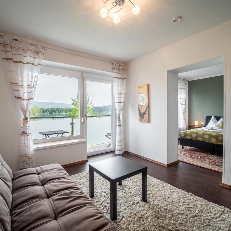 Faaker See Inn by Aurora - Familienzimmer mit Seeblick - 3