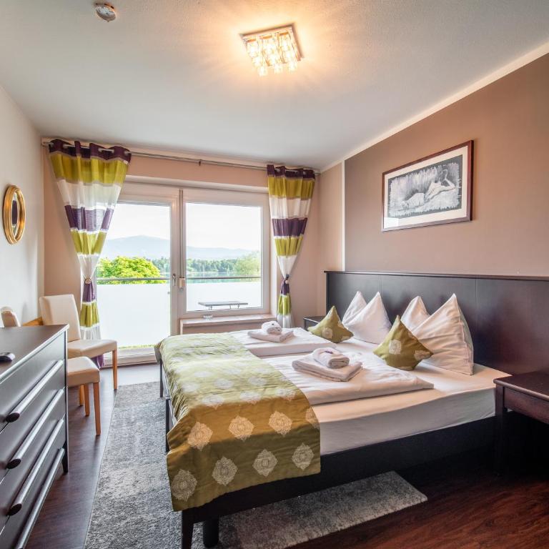 Faaker See Inn by Aurora - Doppelzimmer mit Seeblick - 6