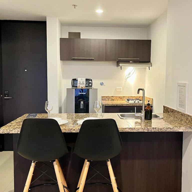 Fully equipped suite near JMC airport - Vacation Home - 12