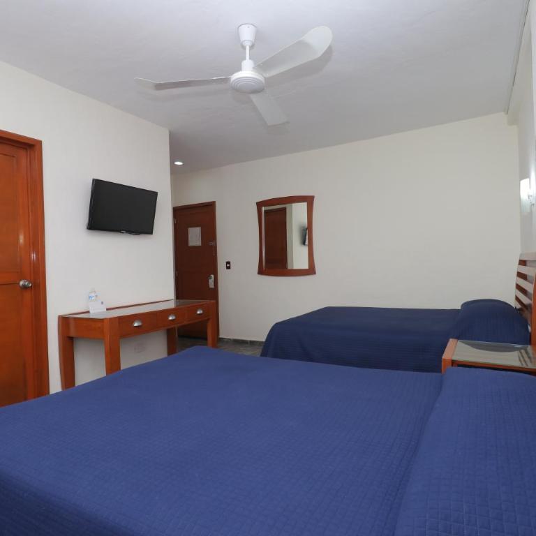 Hotel Soberanis - Habitación Cuádruple Clásica - 17