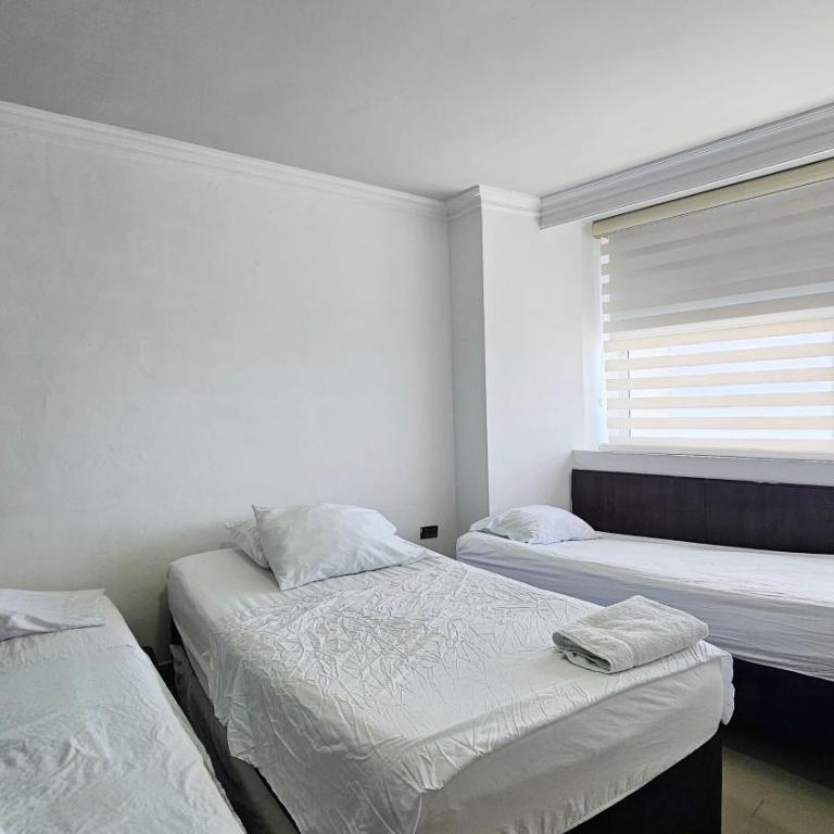 Apartahotel el Laguito Por Parceros Group - Three-Bedroom Standard Apartment - 11