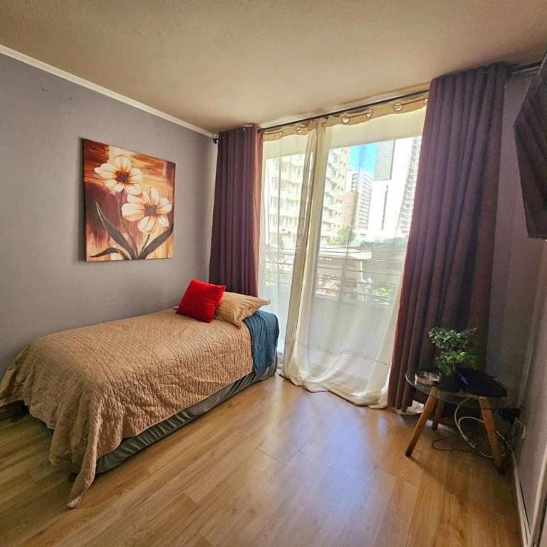departamentos amoblados AVILA bulnes la moneda - Triple Room with Balcony - 8