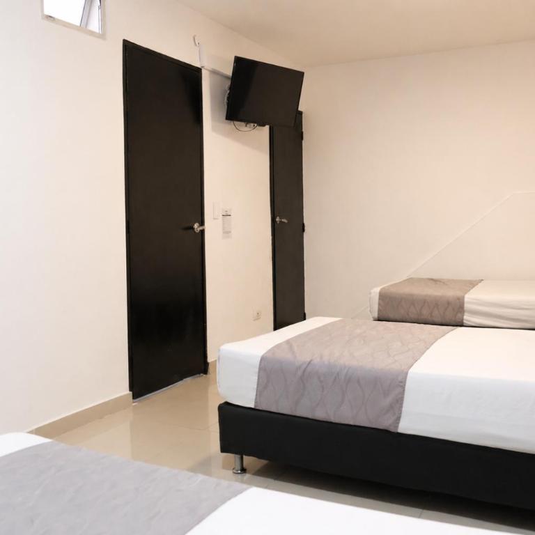 Hotel Palmas del Estadio - Habitación Triple - 5