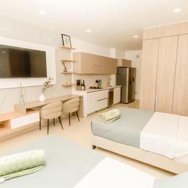 Exclusiva suite moderna con balcón cerca al mar - One-Bedroom Apartment - 6