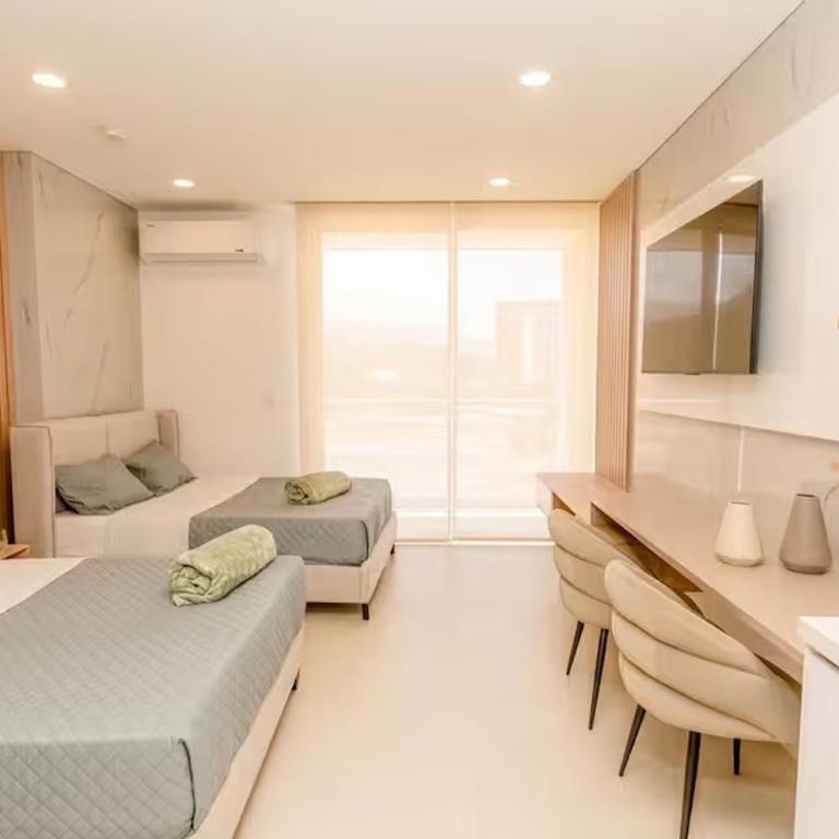 Exclusiva suite moderna con balcón cerca al mar - One-Bedroom Apartment - 9