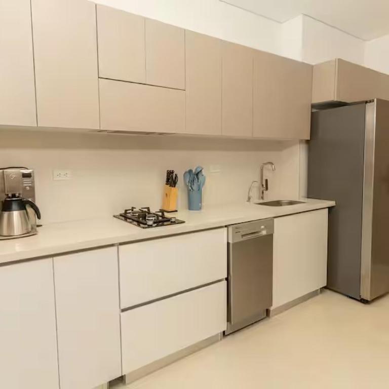 Exclusiva suite moderna con balcón cerca al mar - One-Bedroom Apartment - 13