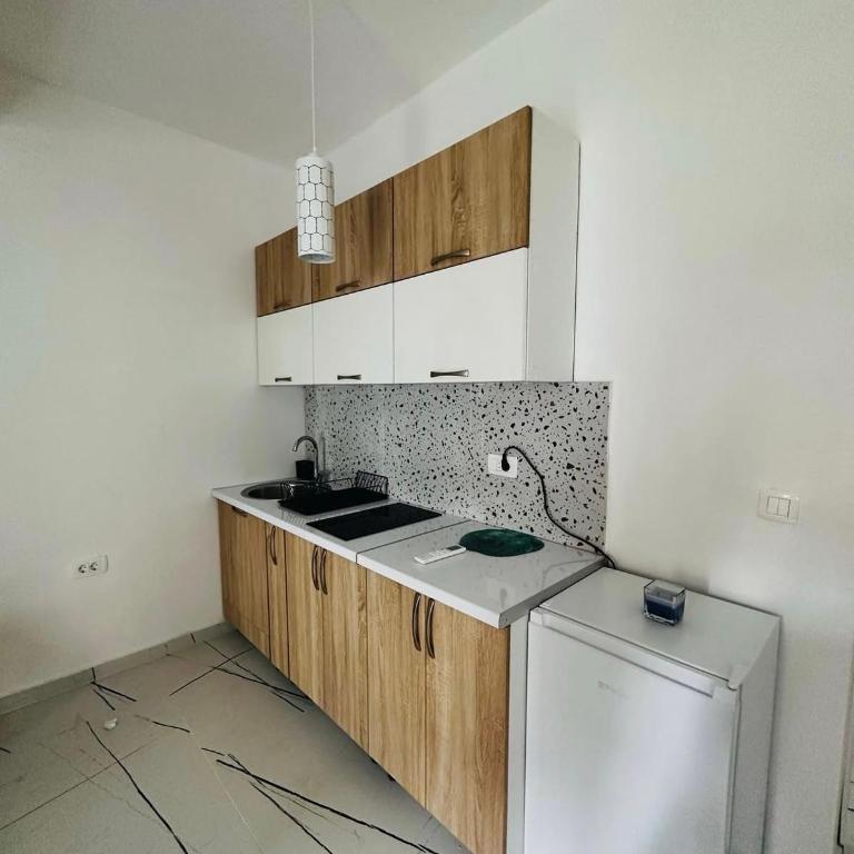 Sarah Apartments - One-Bedroom Apartment - 1