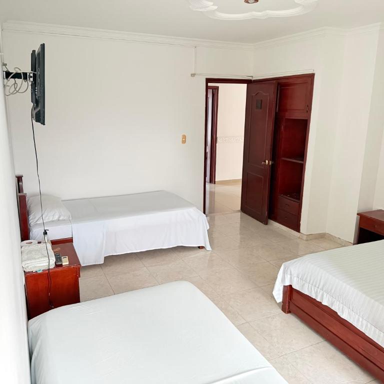 Hotel el Portal de los Ángeles - Habitación Triple con balcón - 1