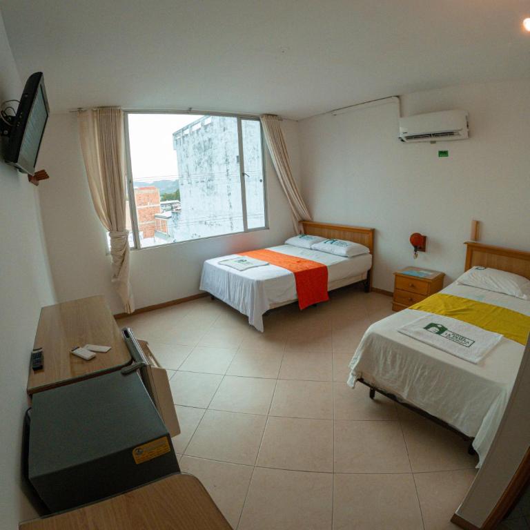 Hotel BENNY Los Leones Melgar - Habitación Triple Deluxe - 2