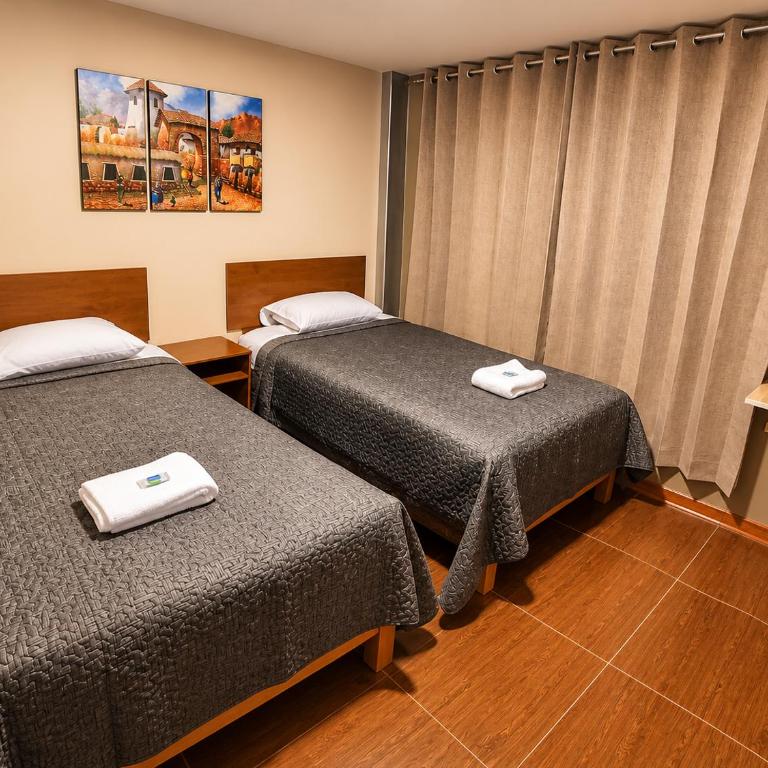Hospedaje Casa Huayra - Habitación Doble con baño compartido - 2 camas - 3