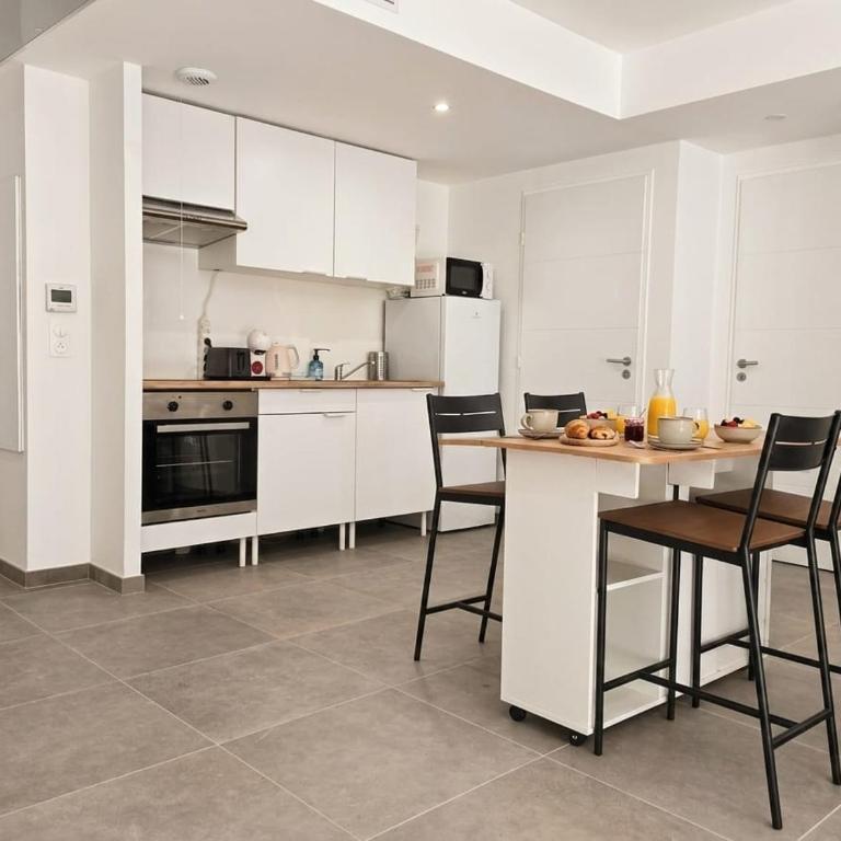 Casa Loubet - Rez-de-jardin avec piscine rooftop, salle de sport & parking privé - BY AURAconciergerie - Apartamento de 1 dormitorio con jardín - 5