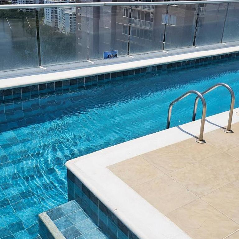 Cozy Apartment Near the Beach, Pool Access, Hot Water - Apartment - 24