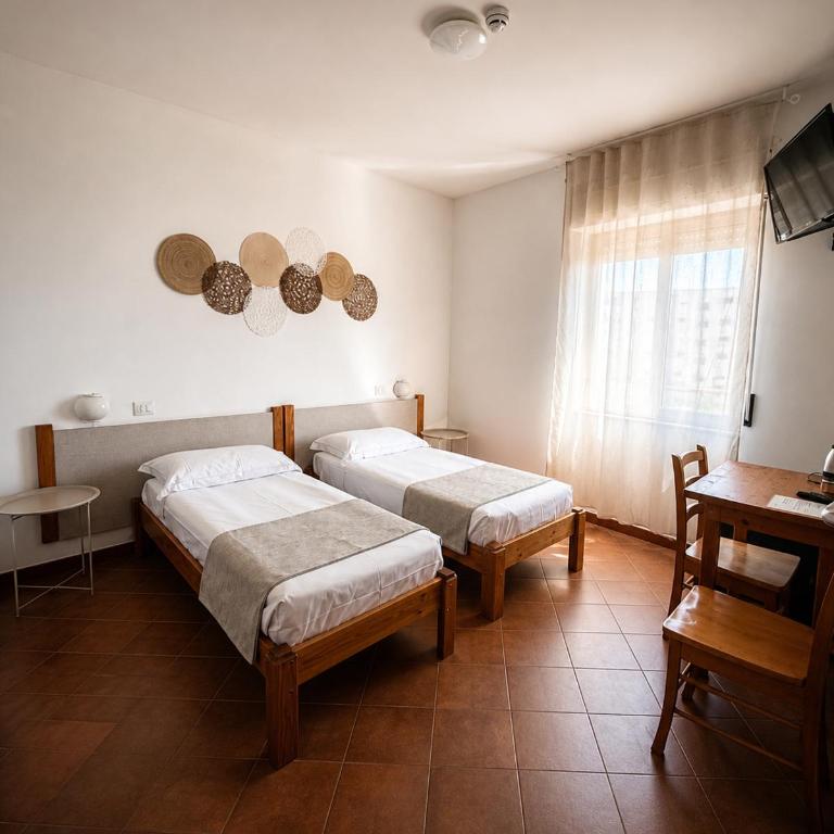 Hotel Mistral - Camera Doppia con Letti Singoli - 1