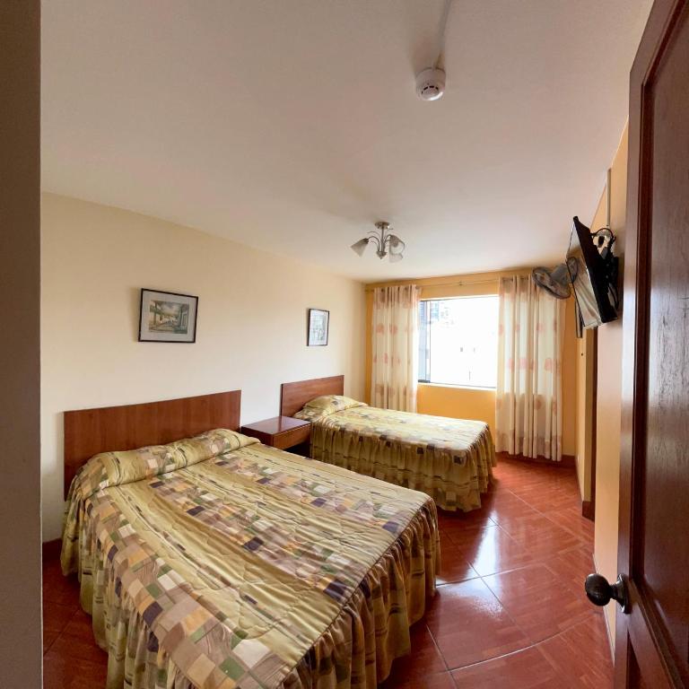 Hotel Nirvana Miraflores - Classic Quadruple Room - 3