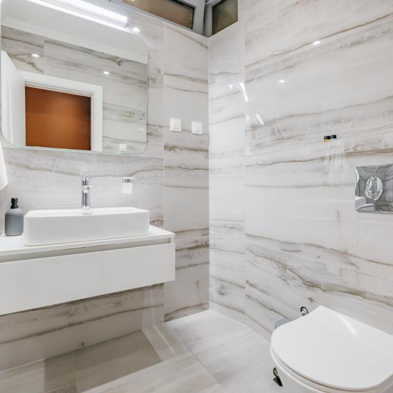 ARABESQUE Apartments & Suite - Deluxe Triple Room with Sea View - 11