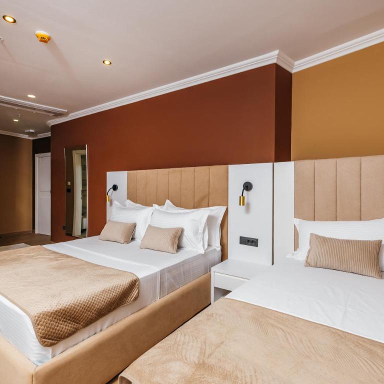ARABESQUE Apartments & Suite - Deluxe Triple Room with Sea View - 8