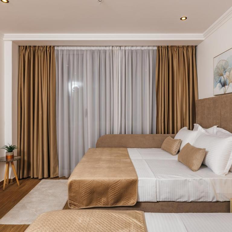 ARABESQUE Apartments & Suite - Deluxe Triple Room with Sea View - 6