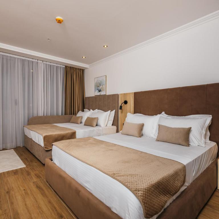 ARABESQUE Apartments & Suite - Deluxe Triple Room with Sea View - 7