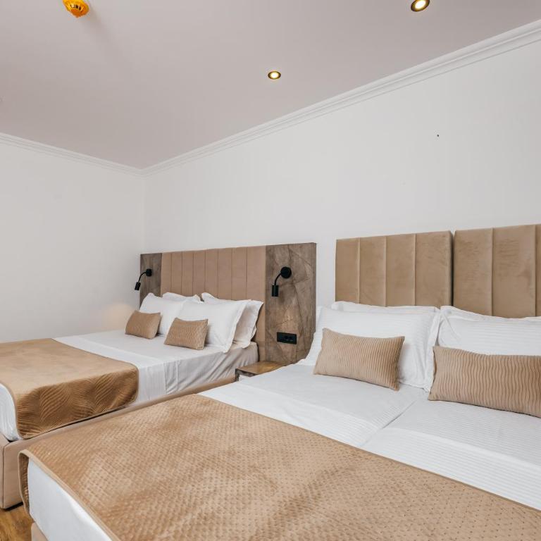 ARABESQUE Apartments & Suite - Deluxe Triple Room with Sea View - 9