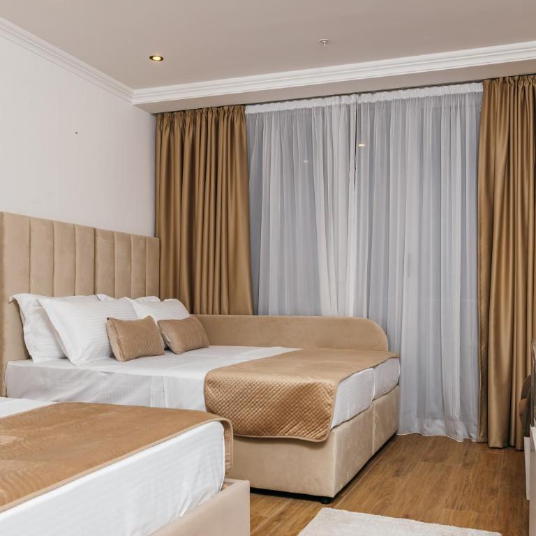 ARABESQUE Apartments & Suite - Deluxe Triple Room with Sea View - 10