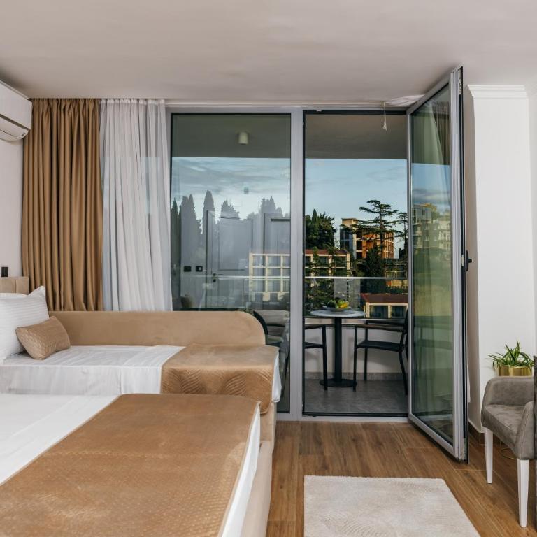ARABESQUE Apartments & Suite - Deluxe Triple Room with Sea View - 10