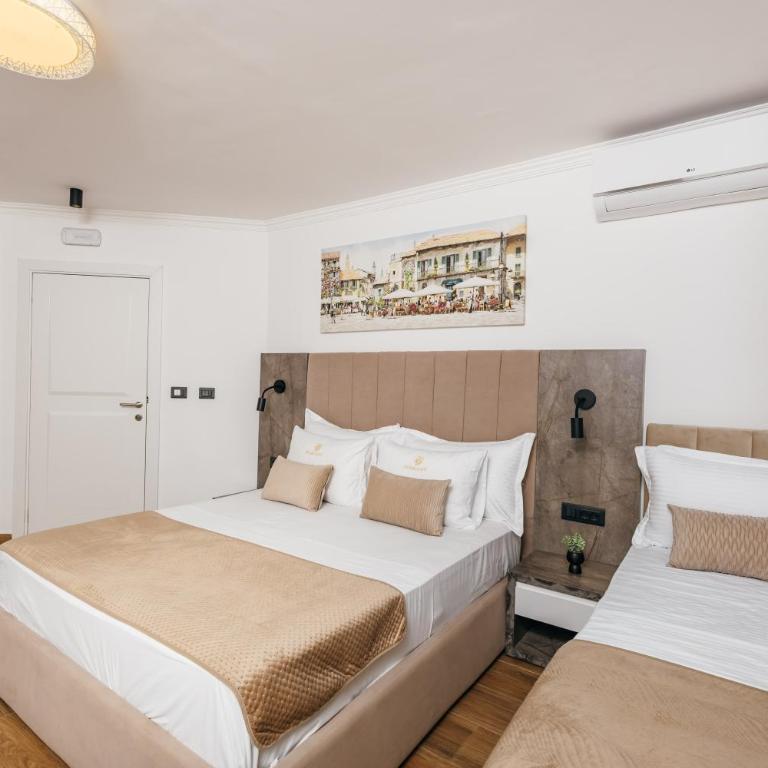 ARABESQUE Apartments & Suite - Deluxe Triple Room with Sea View - 1
