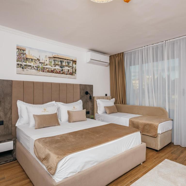 ARABESQUE Apartments & Suite - Deluxe Triple Room with Sea View - 4