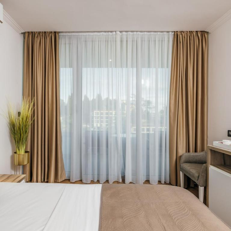 ARABESQUE Apartments & Suite - Deluxe Double Room with Balcony and Sea View - 4