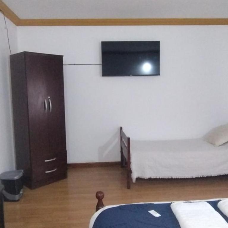 Hostal La Caleta - Classic Triple Room - 13
