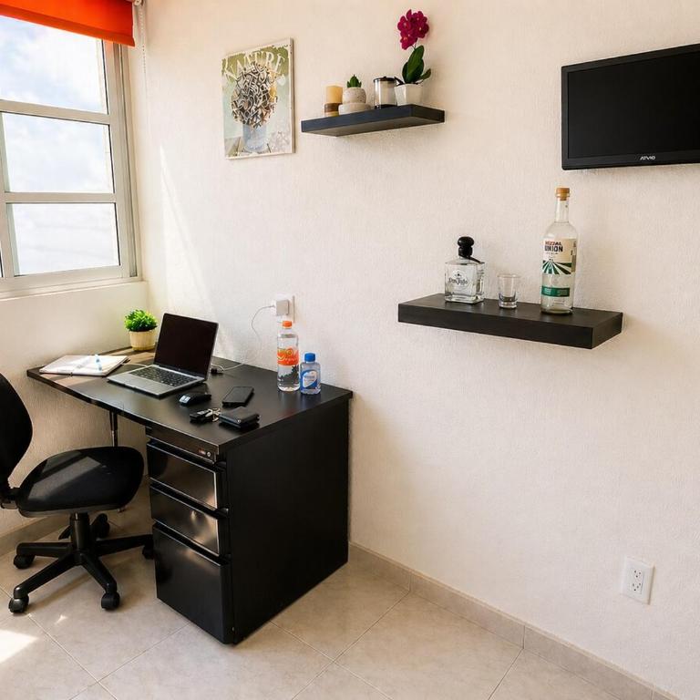 Suite VIP a 10 Min del Estadio - Transporte Incluido - Rooftop - Servicios Exclusivos - One-Bedroom Apartment - 13
