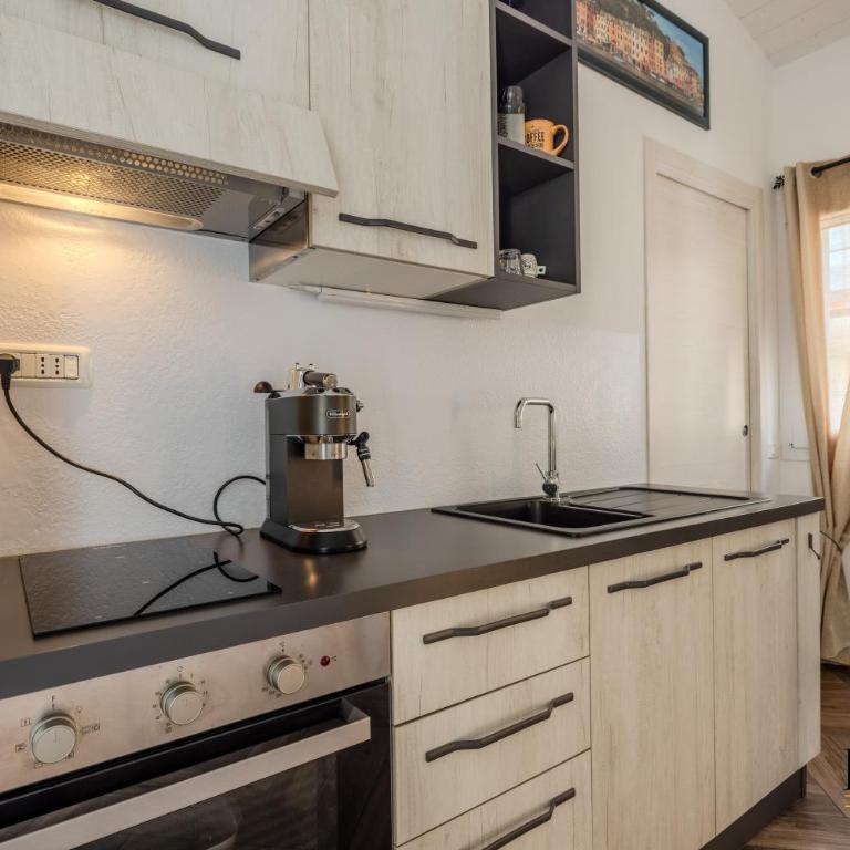 Appartamento in Centro a Olbia con Parcheggio Privato e Balcone - Appartamento con 1 Camera da Letto - 17