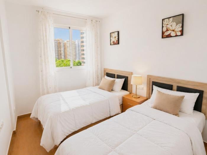 Apartamento con piscina y parking cerca del mar - Two-Bedroom Apartment - 24
