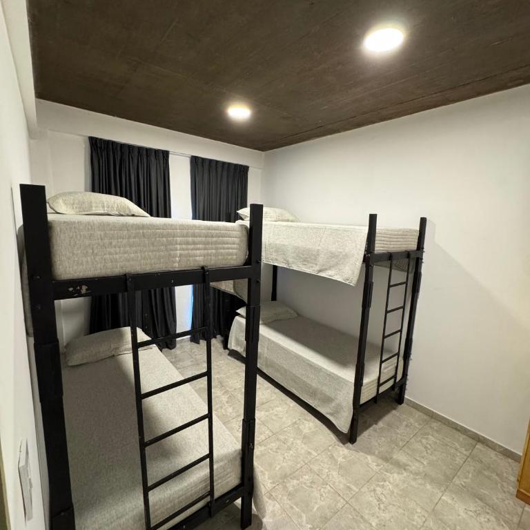 Urban River Hostel - Quadruple Room with Garden View - 1