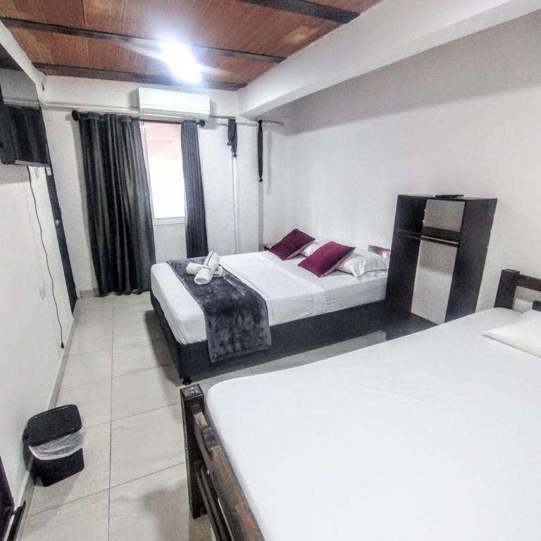 Hotel Coralite Suites Santa Marta - Habitación Triple Deluxe - 4