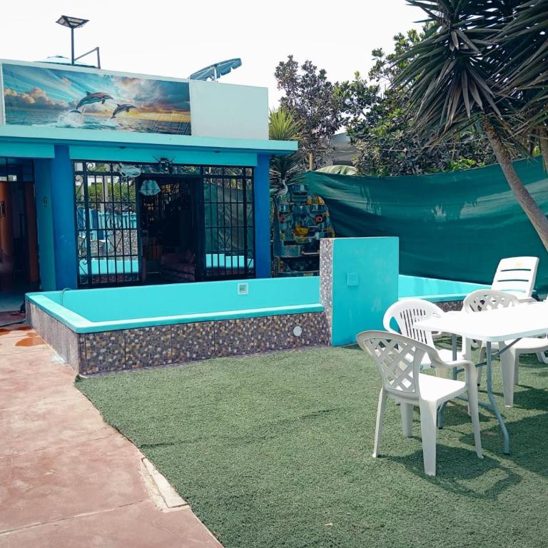 Encanto azul Jardín, Parrilla y juegos - Four-Bedroom House - 2