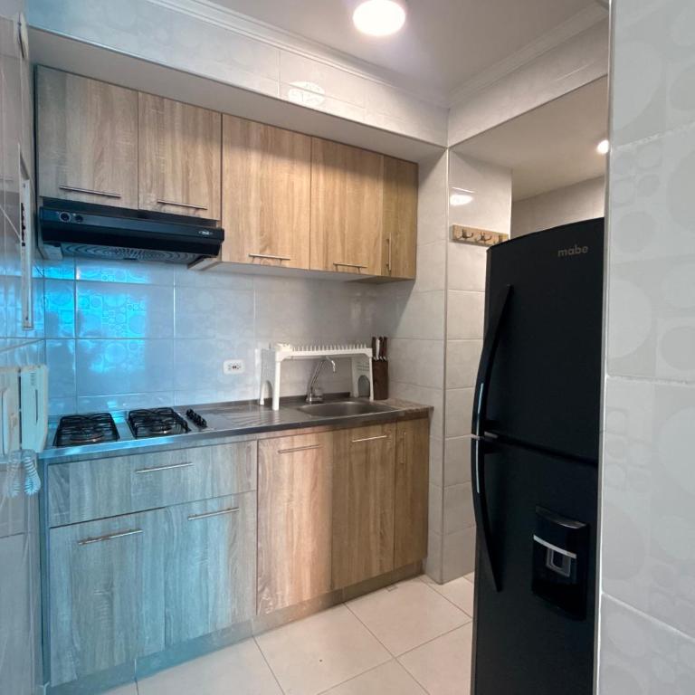 Apartamento de 3 habitaciones amoblado cerca de la playa - Three-Bedroom Apartment - 9