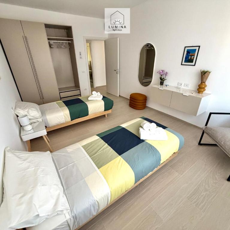 Lumina - Light Stays - Nuovissimo Attico con 2 Bagni - Two-Bedroom Deluxe Apartment with Balcony - 24