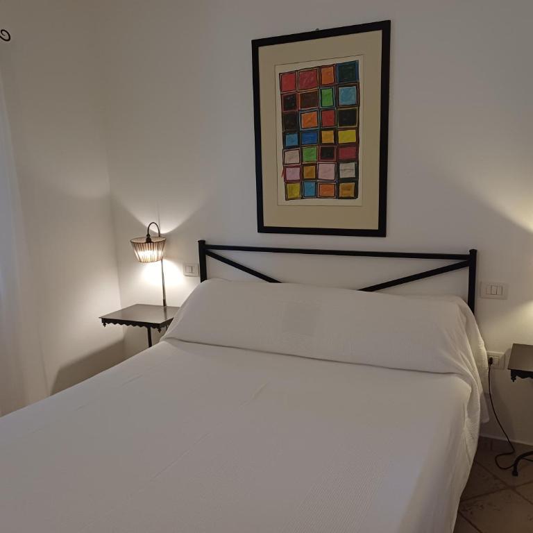Sole e Sale in Sardegna - Appartamento con 2 Camere da Letto e Patio - 3