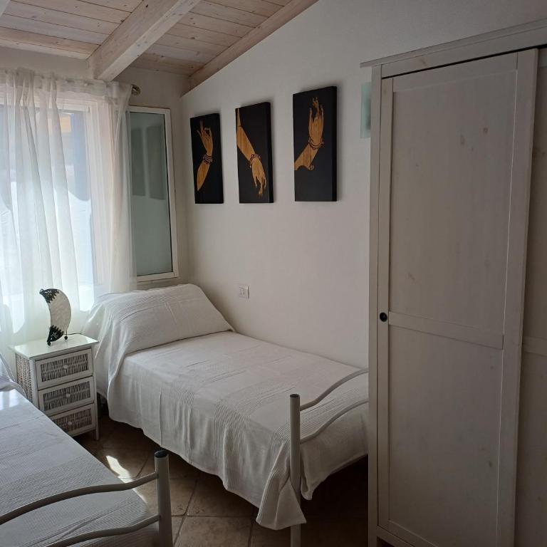Sole e Sale in Sardegna - Appartamento con 2 Camere da Letto e Patio - 8