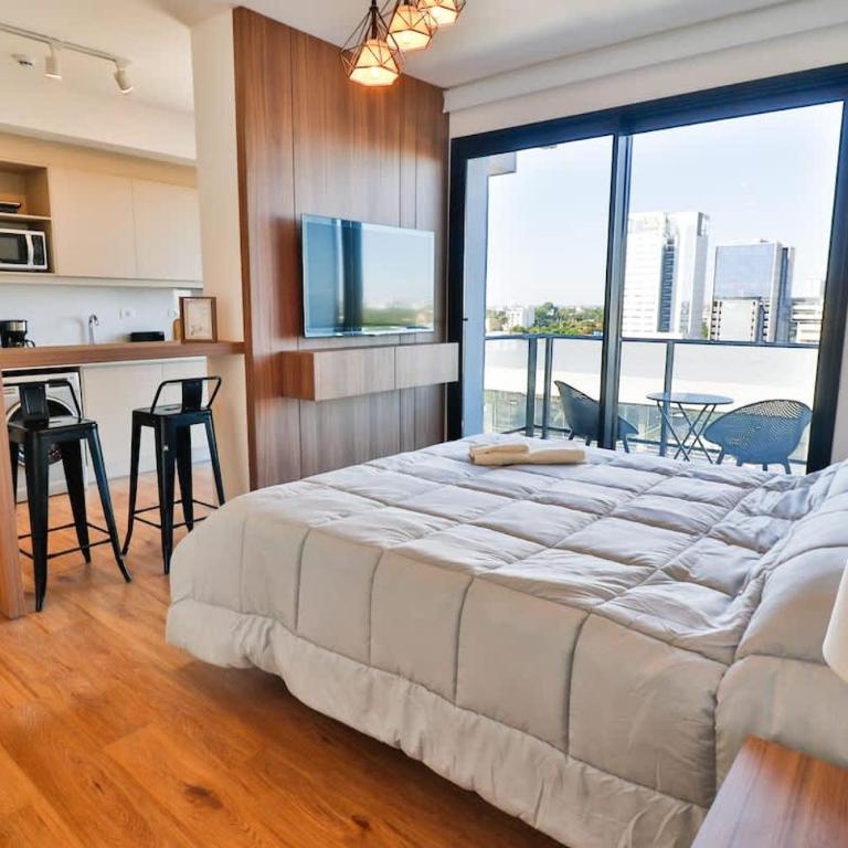 Stylish Retreat Steps from Shopping del Sol - Apartment - 1
