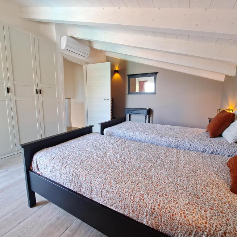 Immobillario - Casa Luna - Appartamento con 2 Camere da Letto e Vista Lago - 16
