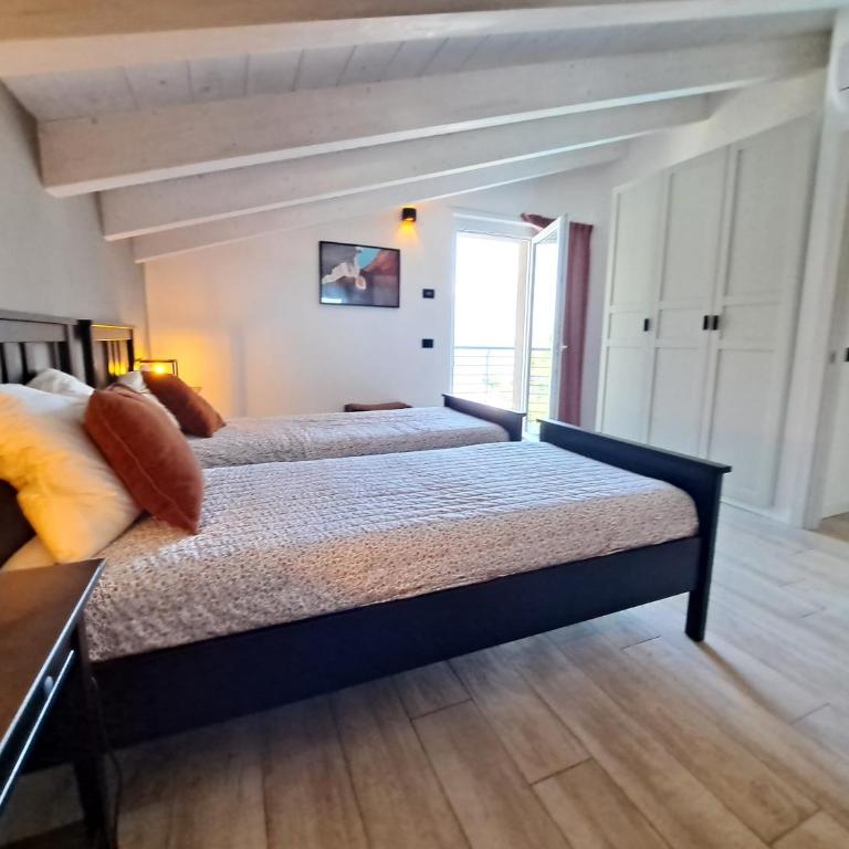 Immobillario - Casa Luna - Appartamento con 2 Camere da Letto e Vista Lago - 17