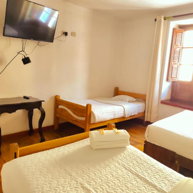 Cusco Plaza de Armas - 4-Bed Male Dormitory Room - 2