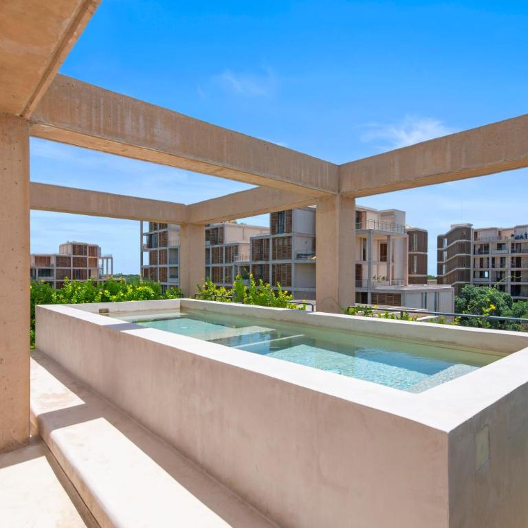 Corasol 2 Bedroom Condo in Playa del Carmen Beach Club Access 7 Min to Beach Pools Gym Golf - Two-Bedroom Apartment with Balcony - 17
